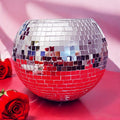 Mirror ball disco globe vase with reflective surface and spherical shape, perfect for decorative centerpieces or modern decor.