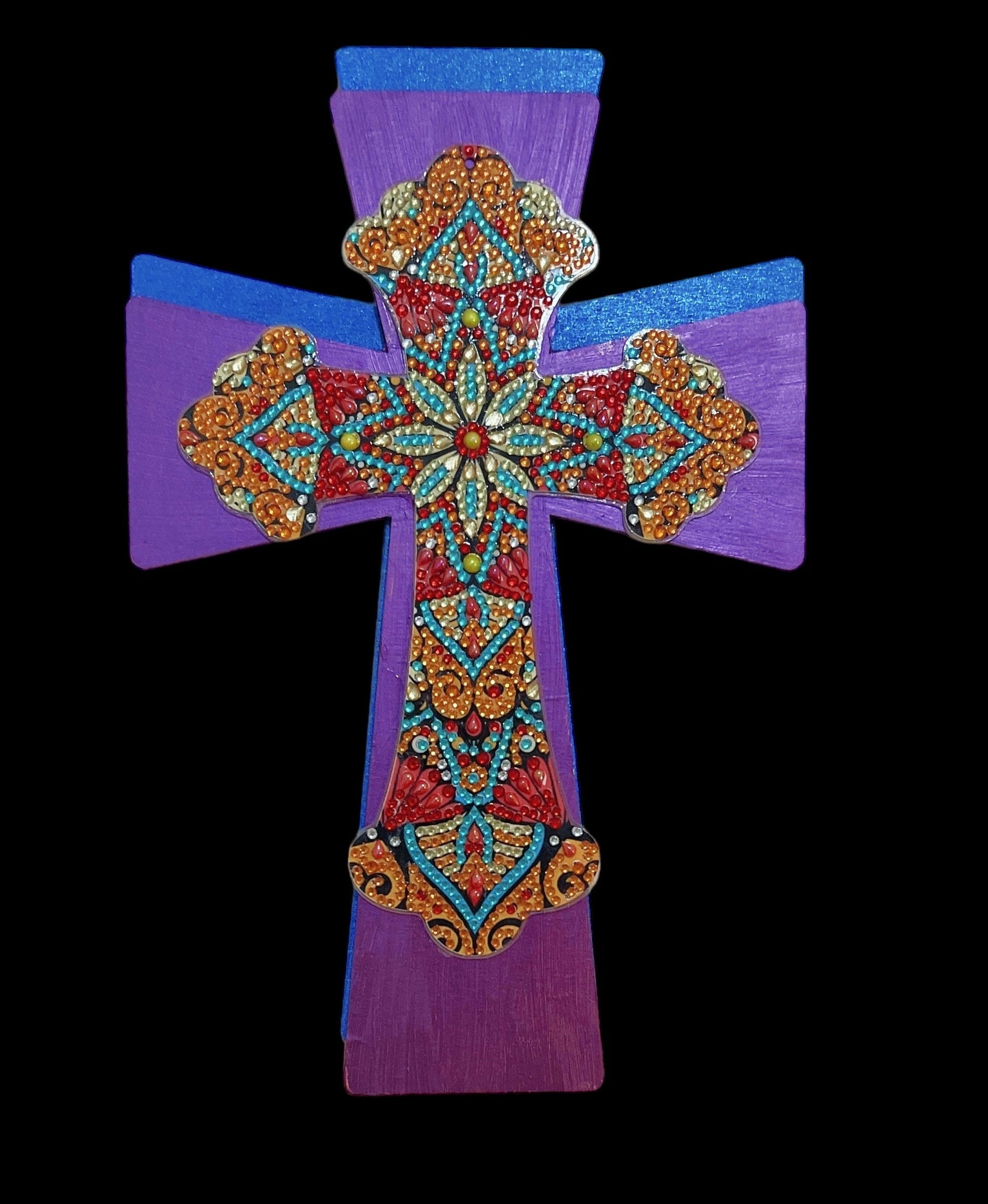 Handmade decorated Christian cross wall hanging with intricate details and craftsmanship, perfect for religious home decor.