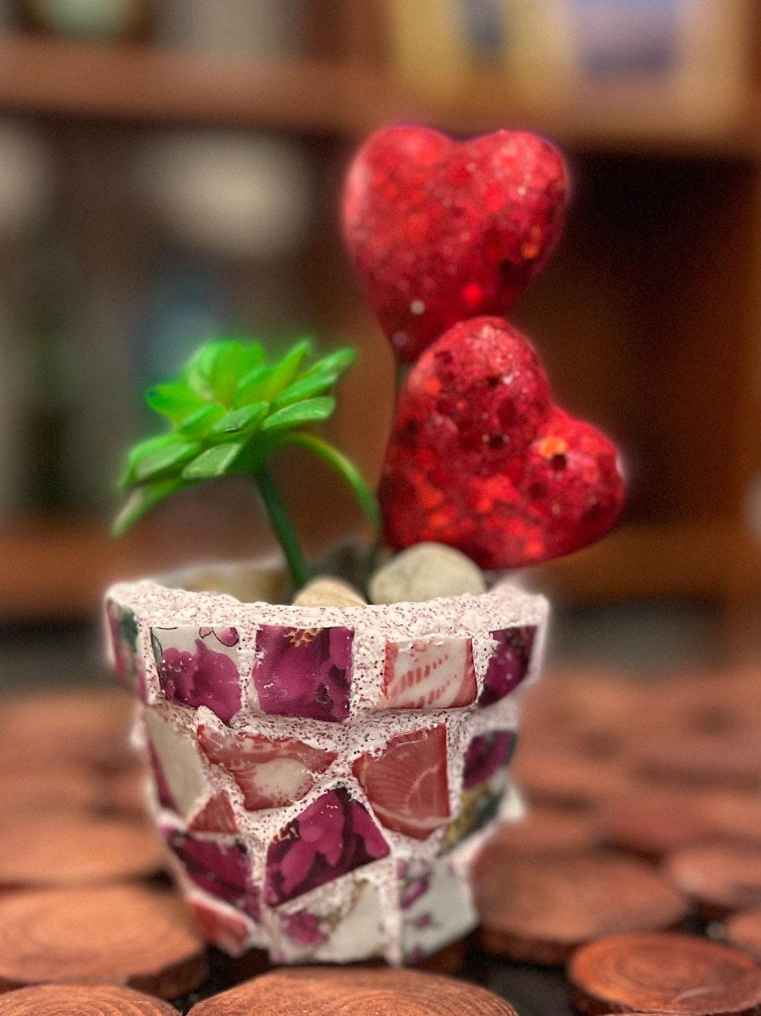 Handcrafted broken china heart mosaic planter with colorful mosaic design, perfect for indoor or outdoor decorative plants.