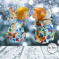 Two handmade Christmas angel decorations with intricate details, perfect for holiday decor and festive ambiance.