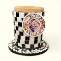 Black and white checkerboard mosaic jar with handcrafted design, featuring intricate tile patterns and a smooth, rounded shape.