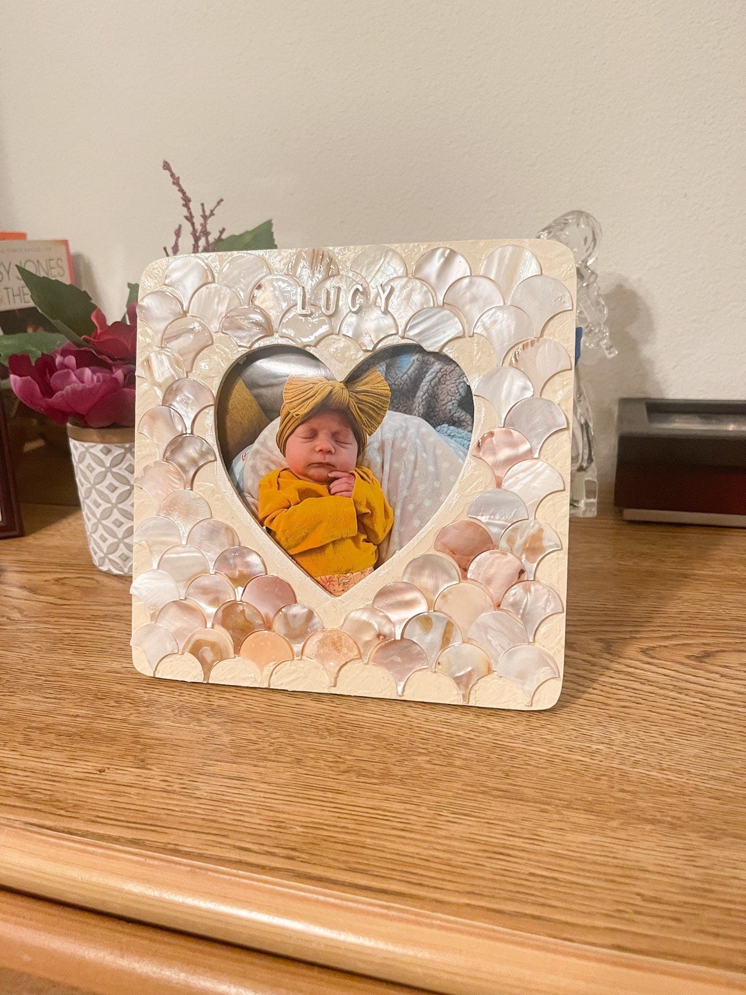 Mother of Pearl personalized photo frame with engraved name, elegant rectangular design, and decorative pearl accents.