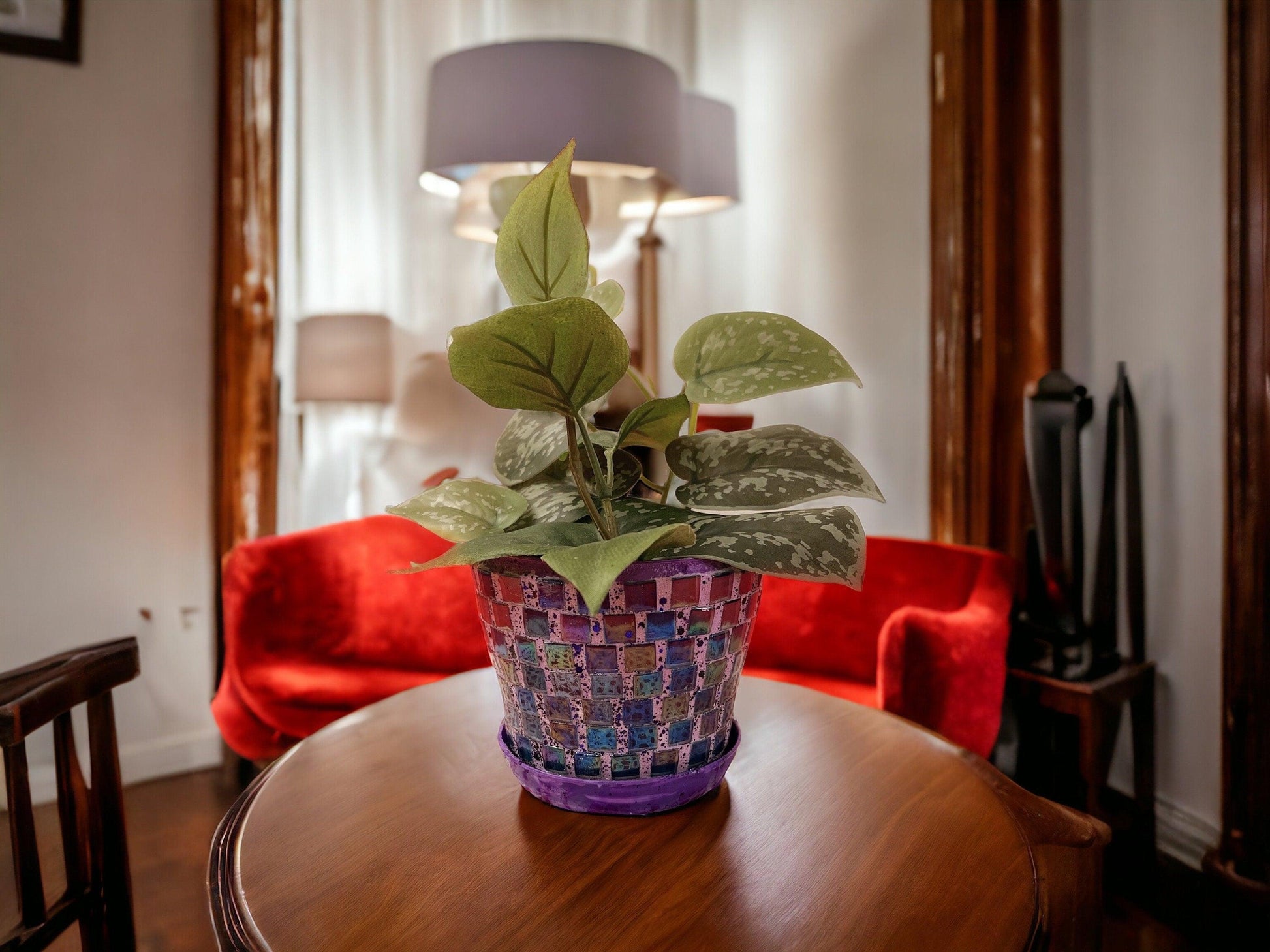 Purple and green mosaic flower pot with floral design, featuring vibrant patterns and a sturdy ceramic construction.