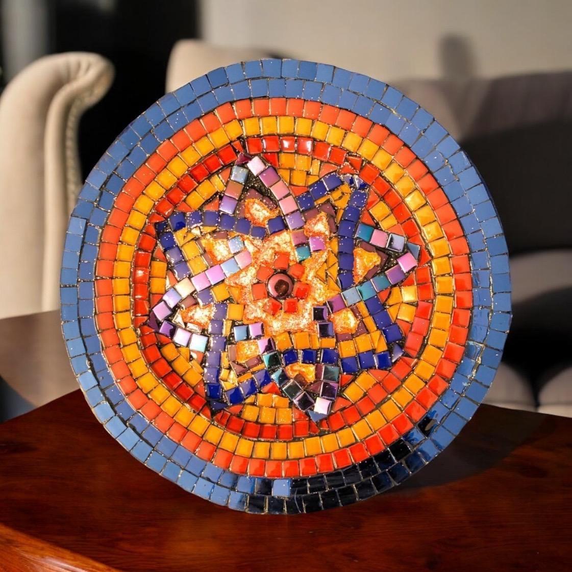 Colorful mid-century modern mosaic decorative plate with intricate geometric patterns and vibrant hues, ideal for wall display.