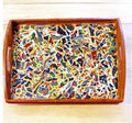 Artisan teal mosaic round box with intricate tile design, perfect for storage or decorative display.