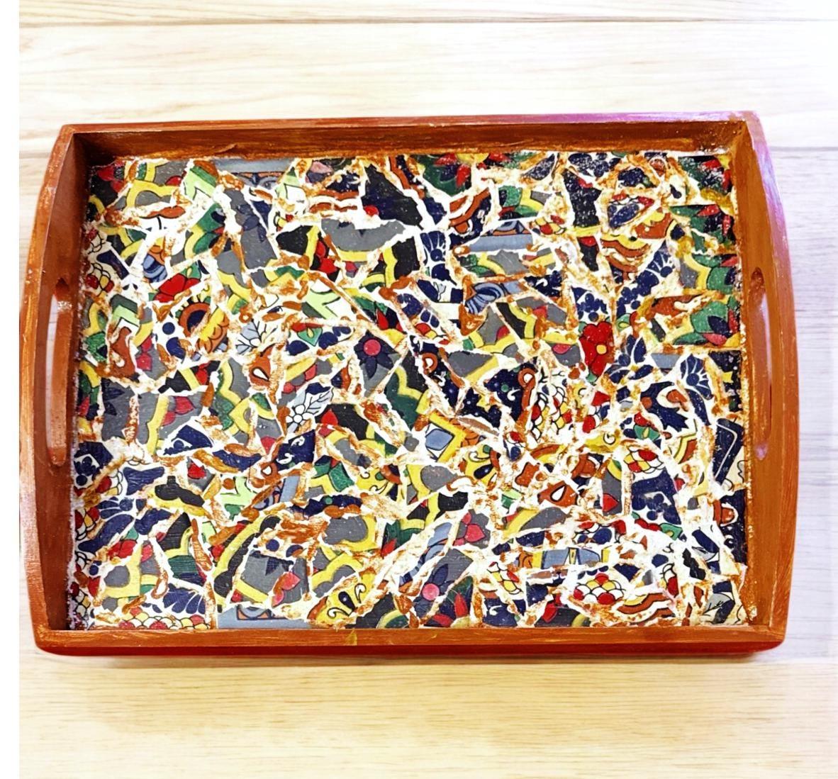 Artisan teal mosaic round box with intricate tile design, perfect for storage or decorative display.