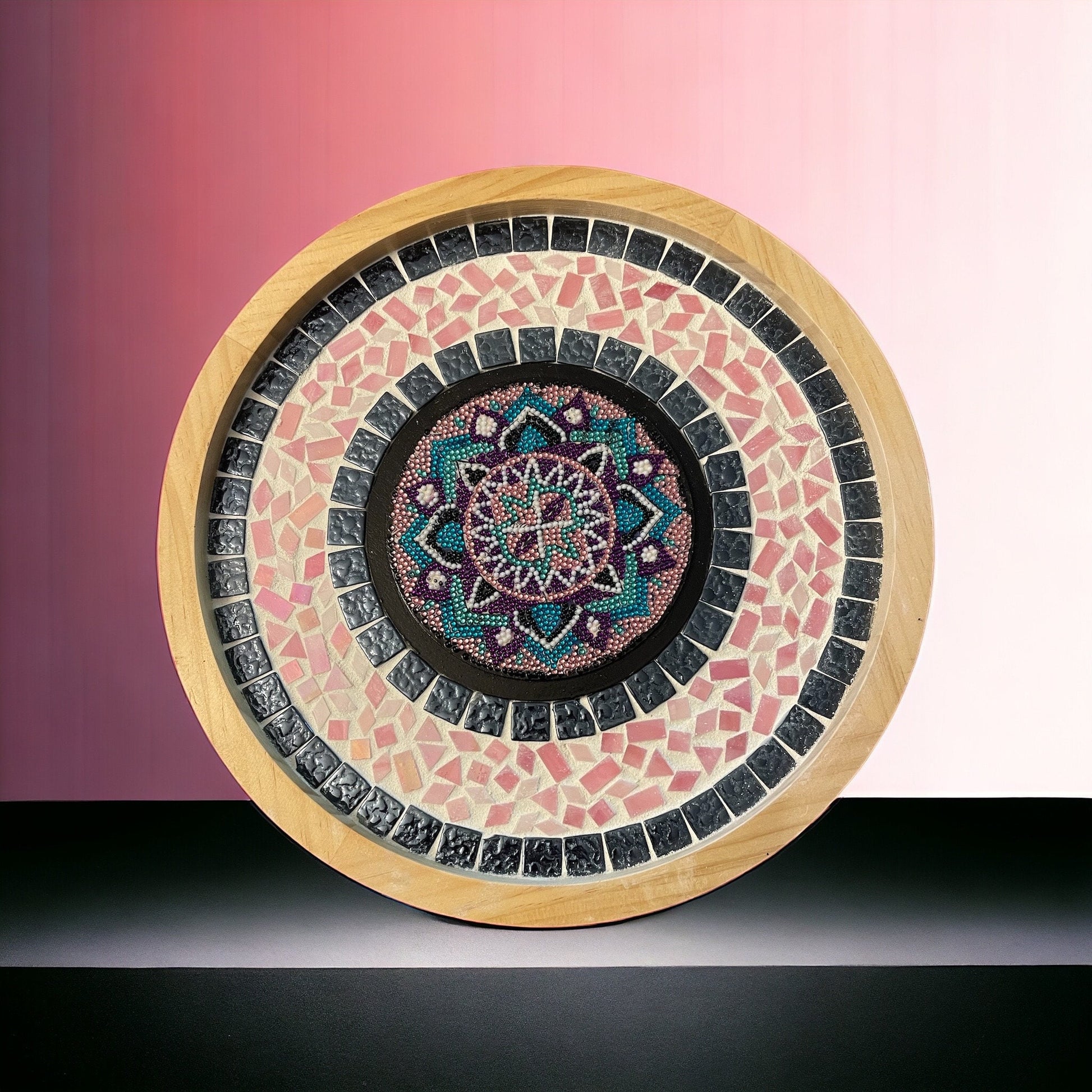 Colorful handcrafted circular mosaic mandala wall art with intricate patterns, perfect for home decor.