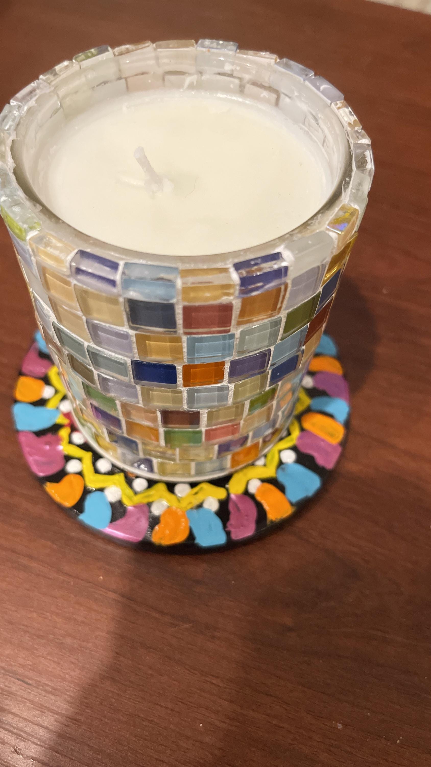 Artisan handcrafted mosaic glass jar with bamboo lid, featuring colorful glass mosaic design and natural bamboo top.
