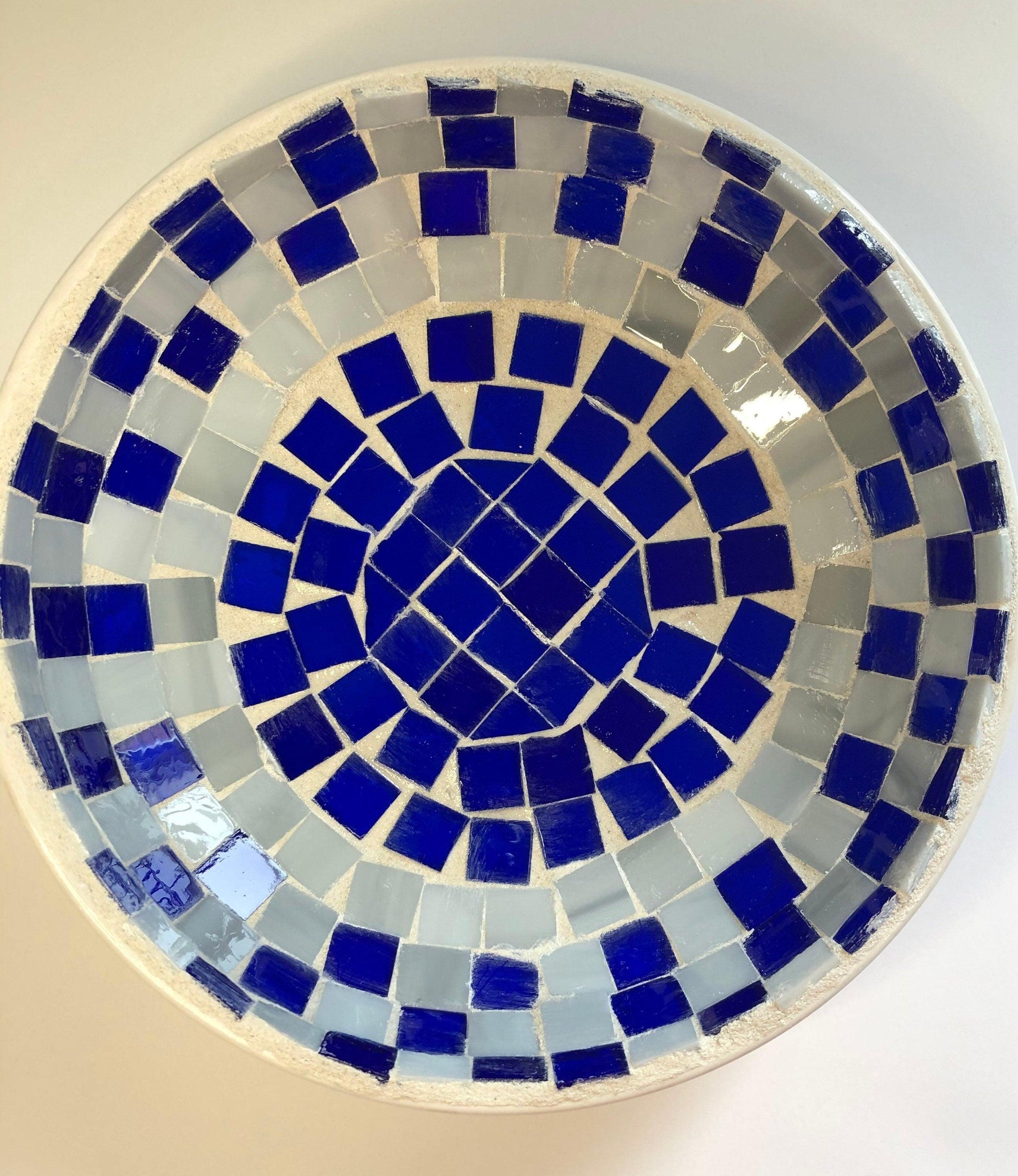 Blue and white stained glass bowl with intricate patterns, handcrafted by My Store, showcasing vibrant colors and detailed design.