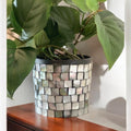 Luminous smoky pearl mosaic vase with intricate pattern, showcasing a glossy finish and elegant design.