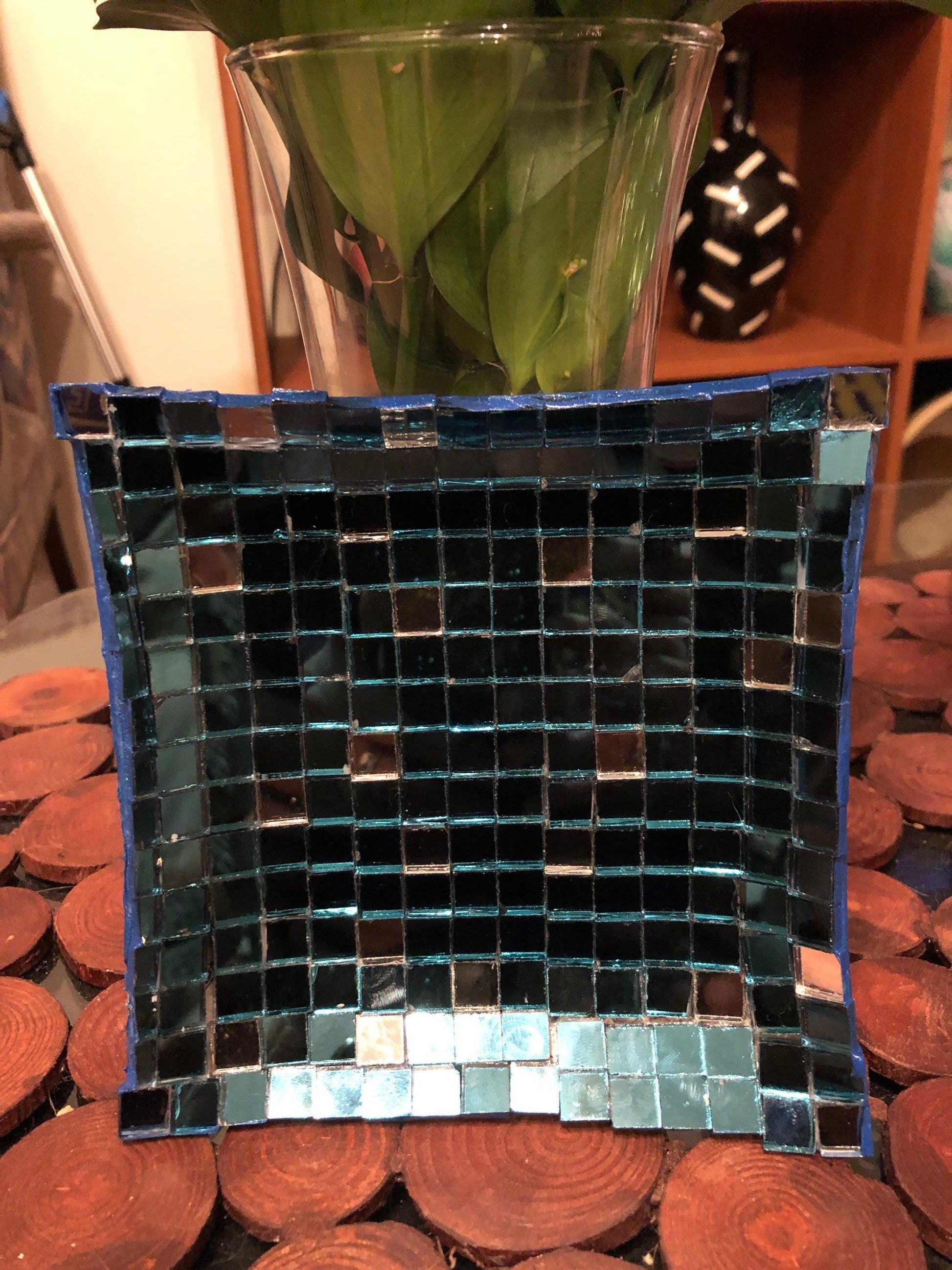 Handcrafted mosaic mirror glass dish with colorful, intricate design, perfect for decorative or functional display.