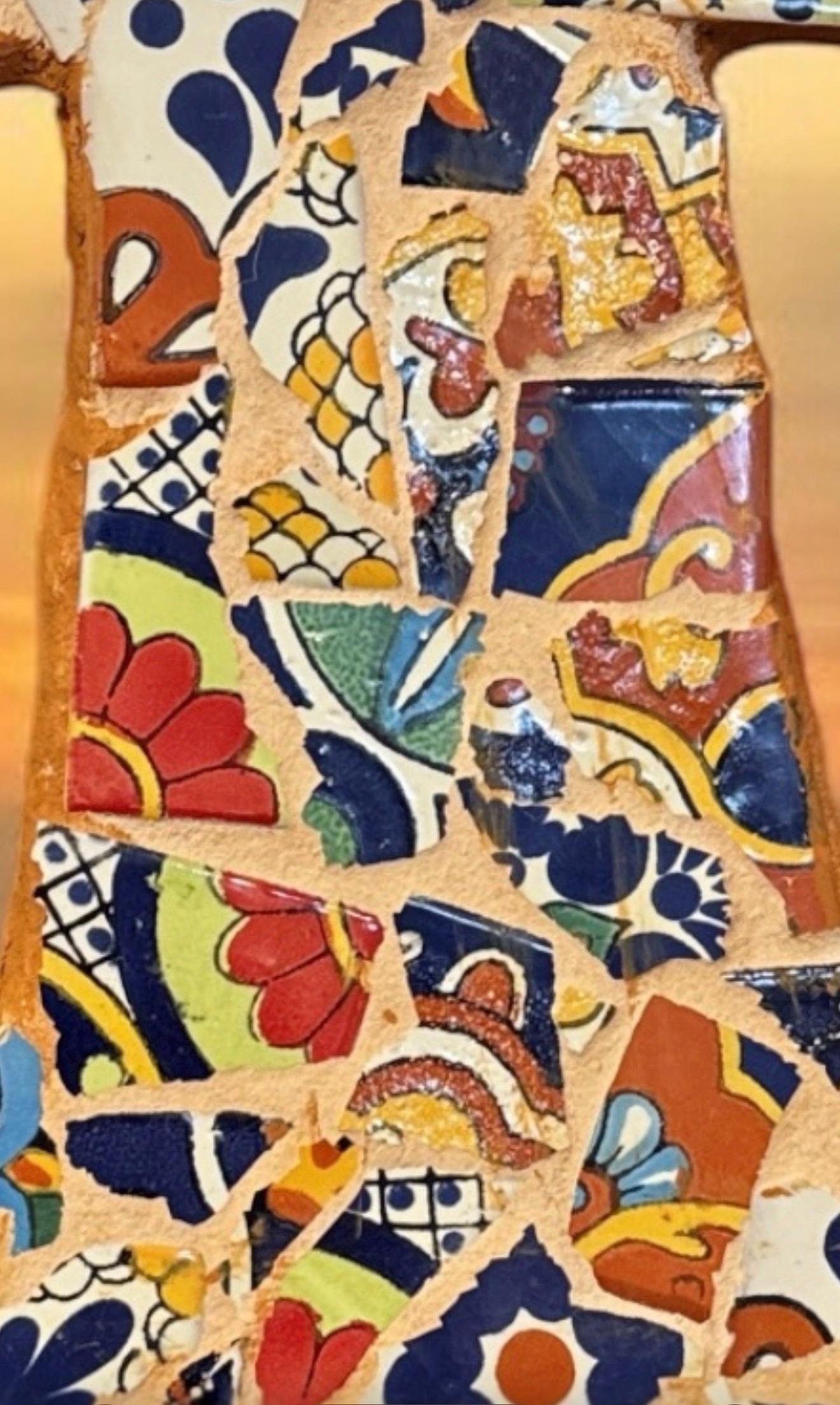 Colorful Mexican mosaic wall cross with intricate Christian design, featuring vibrant tiles and detailed craftsmanship.
