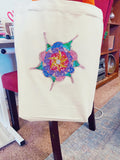 Handmade sparkling starburst diamond art canvas tote bag with colorful geometric design and sturdy handles.