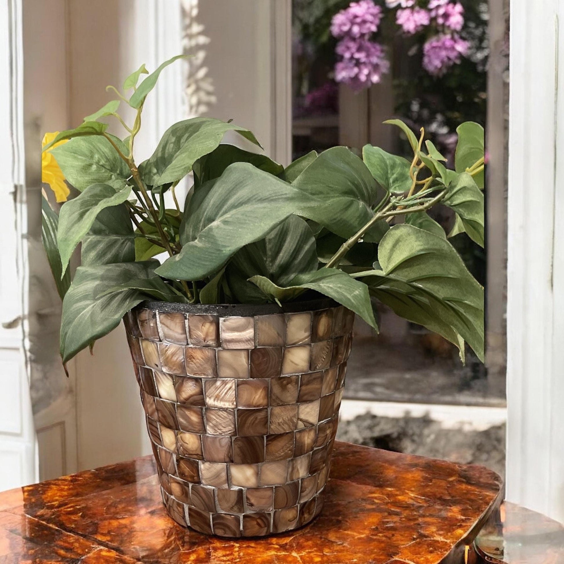 Handcrafted bronze and pearl mosaic planter with intricate design, perfect for indoor or outdoor decorative planting.