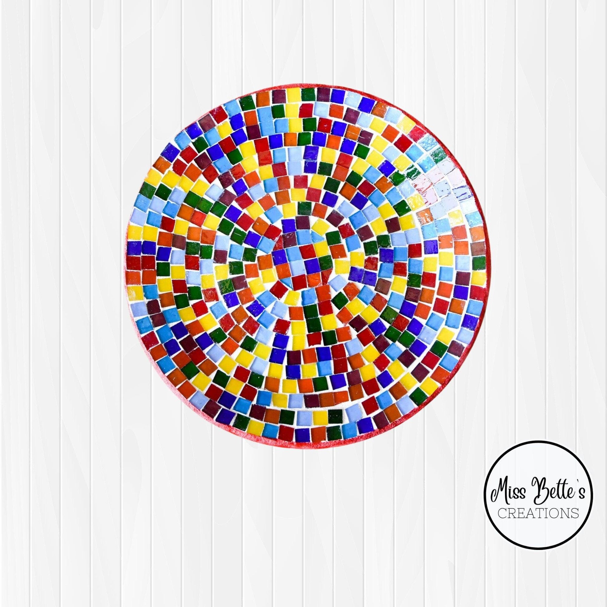 Colorful rainbow mosaic decorative wall plate with intricate patterns, perfect for wall decor in vibrant home interiors.