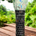 Colorful handcrafted mosaic pedestal planter with intricate tile designs, perfect for indoor or outdoor plant displays.