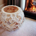 Artisan Mother of Pearl scalloped globe planter with intricate shell design, perfect for indoor or outdoor decorative plants.