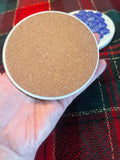 Blue marble mosaic coaster with handcrafted artisanal design, showcasing intricate patterns and smooth surface.