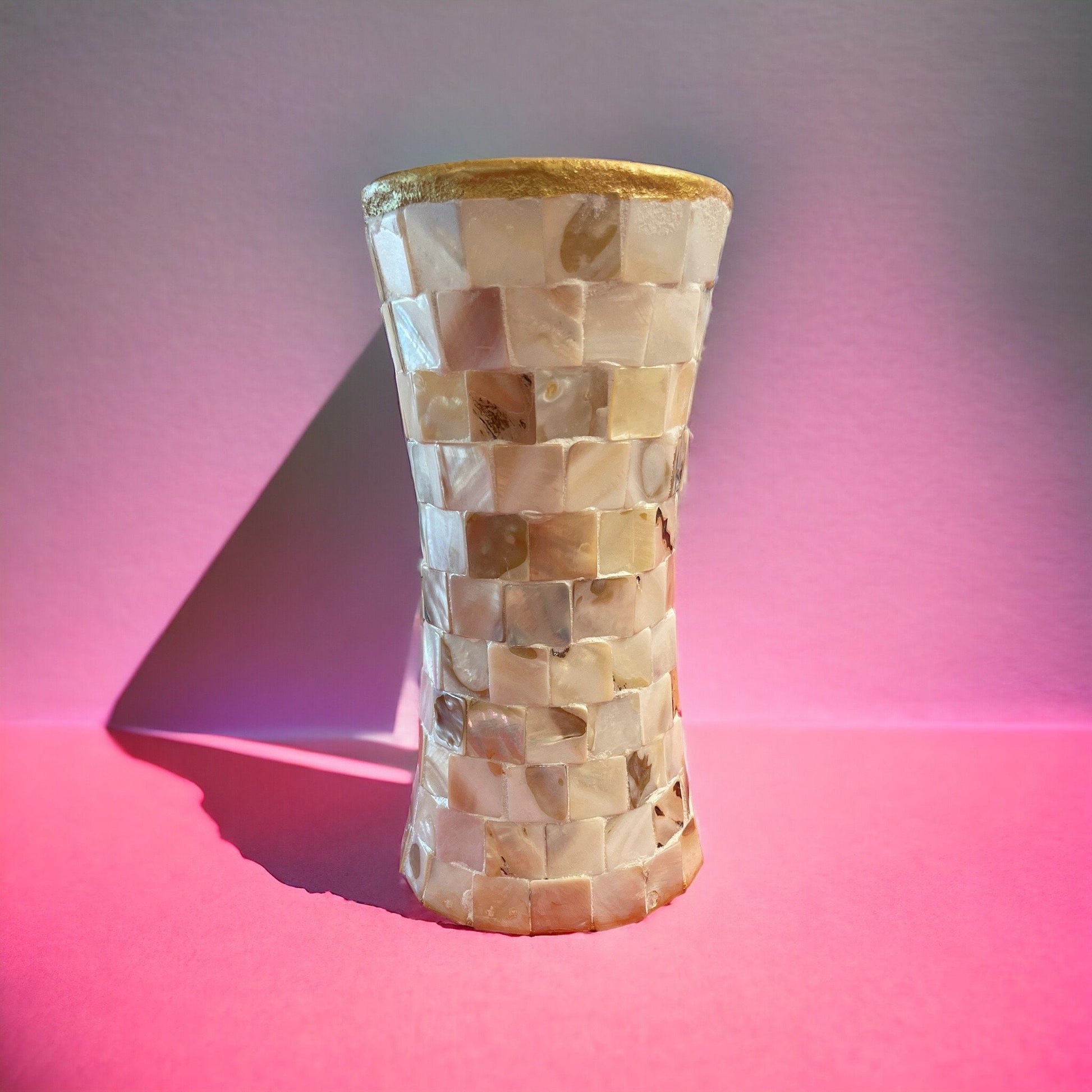 Elegant mother of pearl mosaic flower vase with floral design, showcasing shimmering pearl tiles and a classic shape.