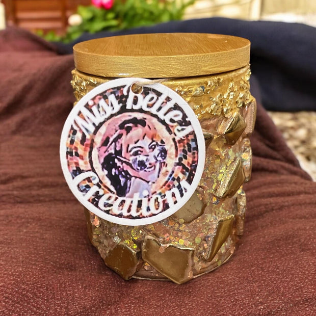Handmade eucalyptus scented candle in hand crafted gold mosaic glass jar.