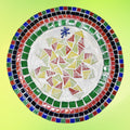 Artisan handcrafted round mosaic decorative plate with colorful intricate tile patterns, perfect for home decor.
