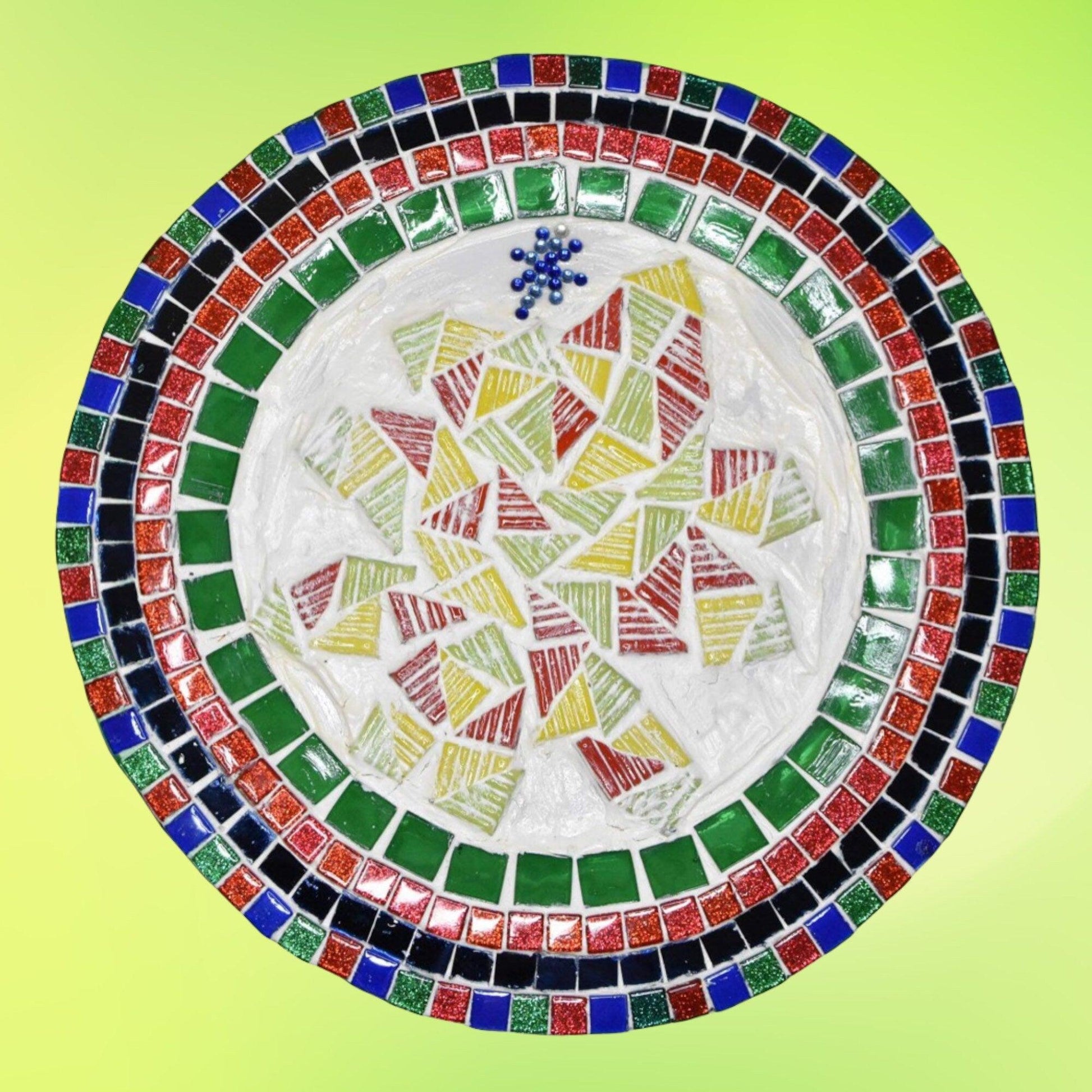Artisan handcrafted round mosaic decorative plate with colorful intricate tile patterns, perfect for home decor.