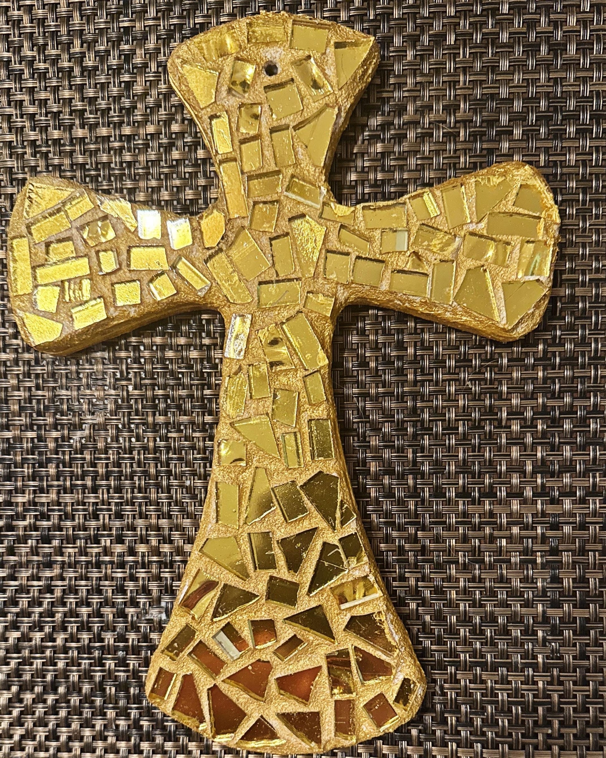 Handcrafted gold mosaic cross by Miss Bette's Creations, featuring intricate gold tile details and a religious decorative design.