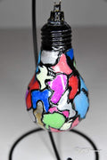 Handmade stained glass mosaic light bulb ornament with colorful holiday design, ideal for festive decorations.