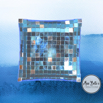 Handcrafted mosaic mirror glass dish with colorful tile patterns, showcasing intricate design and reflective surface.