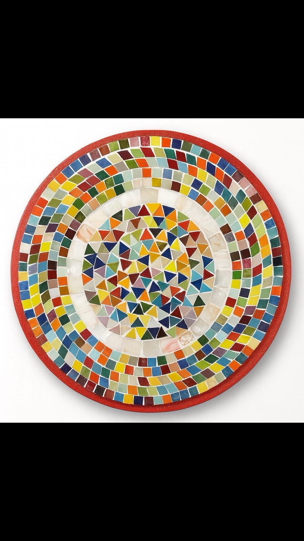 Colorful handcrafted mosaic fruit bowl with vibrant glass pieces, showcasing intricate design and bright fruit motifs.