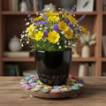 Handcrafted Tree of Life mosaic plant stand with colorful tiles and sturdy metal frame for indoor or outdoor use.
