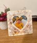 Mother of Pearl personalized photo frame with engraved design, featuring a polished mother of pearl surface and elegant craftsmanship.