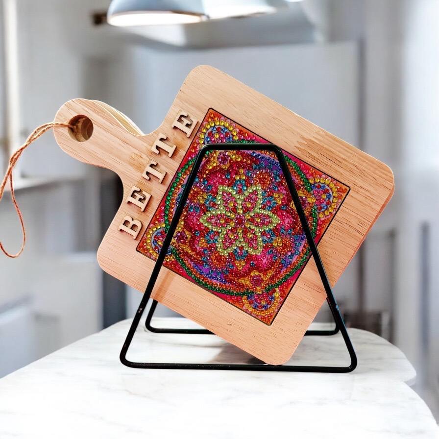 Handcrafted diamond art wood cutting board with intricate design, showcasing natural wood grain and detailed diamond pattern.
