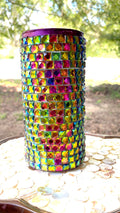 Prismatic rainbow mosaic cylindrical vase with colorful glass tiles, ideal for floral arrangements or decorative display.
