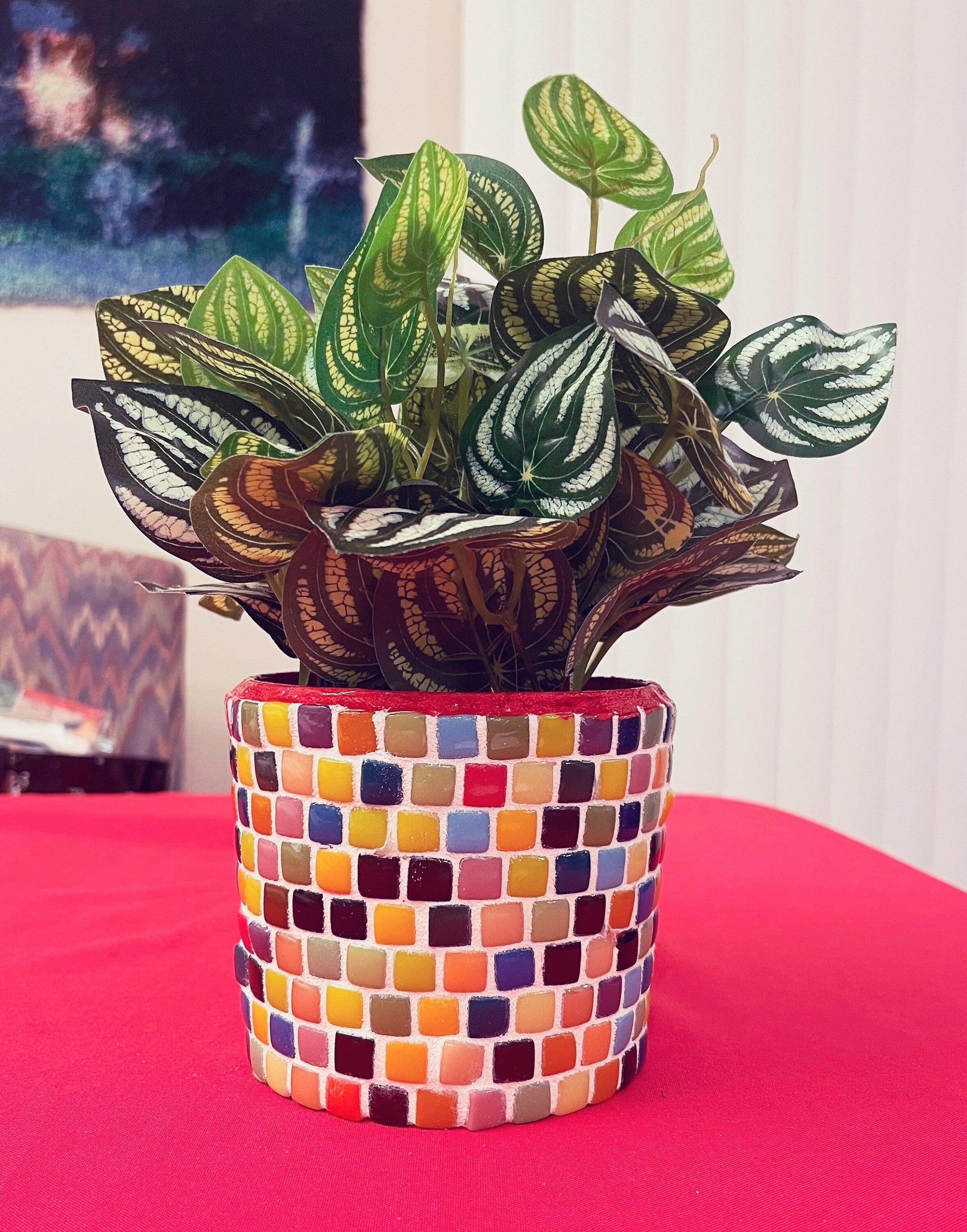 Colorful handcrafted rainbow mosaic planter with vibrant tile patterns, perfect for indoor or outdoor plant display.