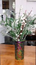 Prismatic rainbow mosaic cylindrical vase with colorful glass tiles, decorative home decor piece.