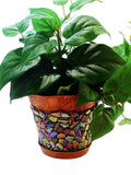 Iridescent mosaic planter with colorful glass tiles, handcrafted decorative container for indoor or outdoor plants.