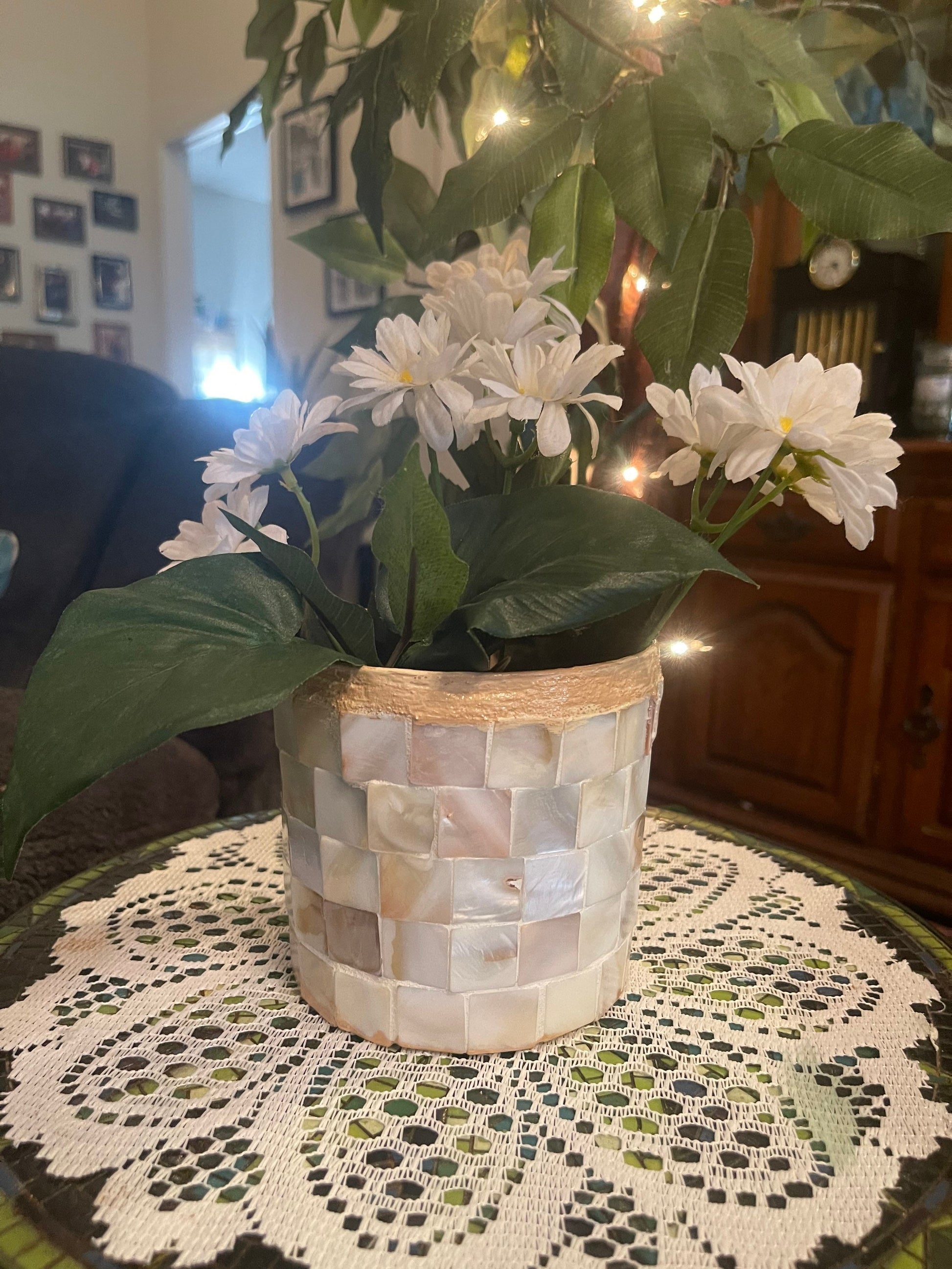 Handcrafted Mother of Pearl Mosaic Planter by Miss Bette's Creations, featuring intricate pearl inlay and a stylish outdoor garden design.