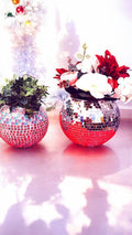 Mirror ball disco globe vase with reflective surface and spherical design, perfect for modern home decor.