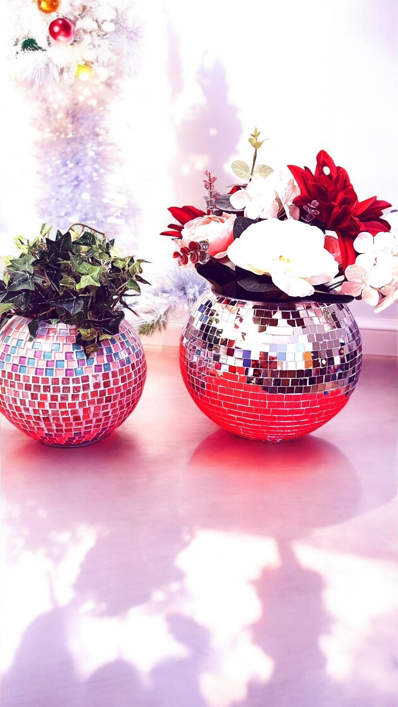 Mirror ball disco globe vase with reflective surface and spherical design, perfect for modern home decor.