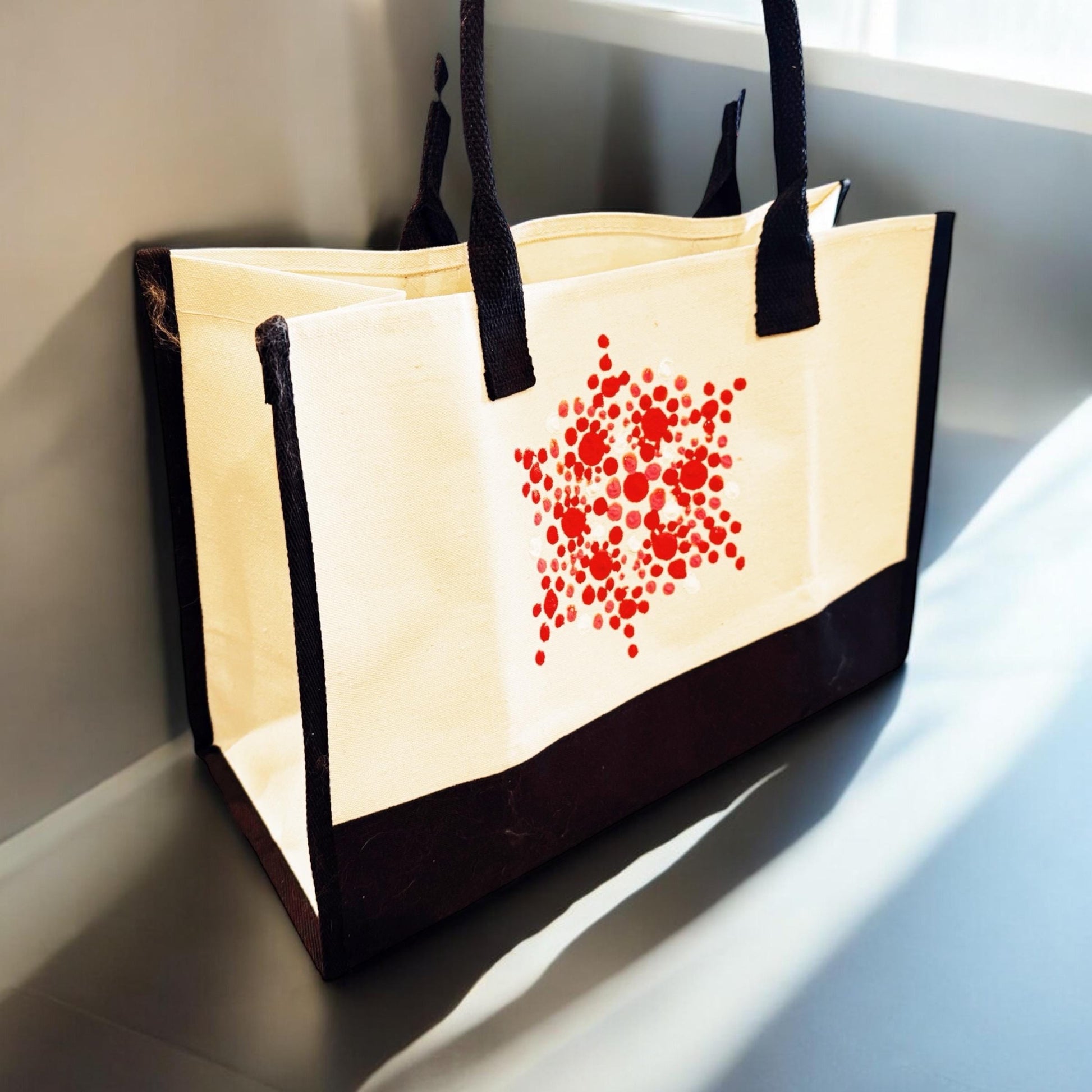 Hand-painted abstract floral canvas tote bag with colorful floral designs on a sturdy fabric background.