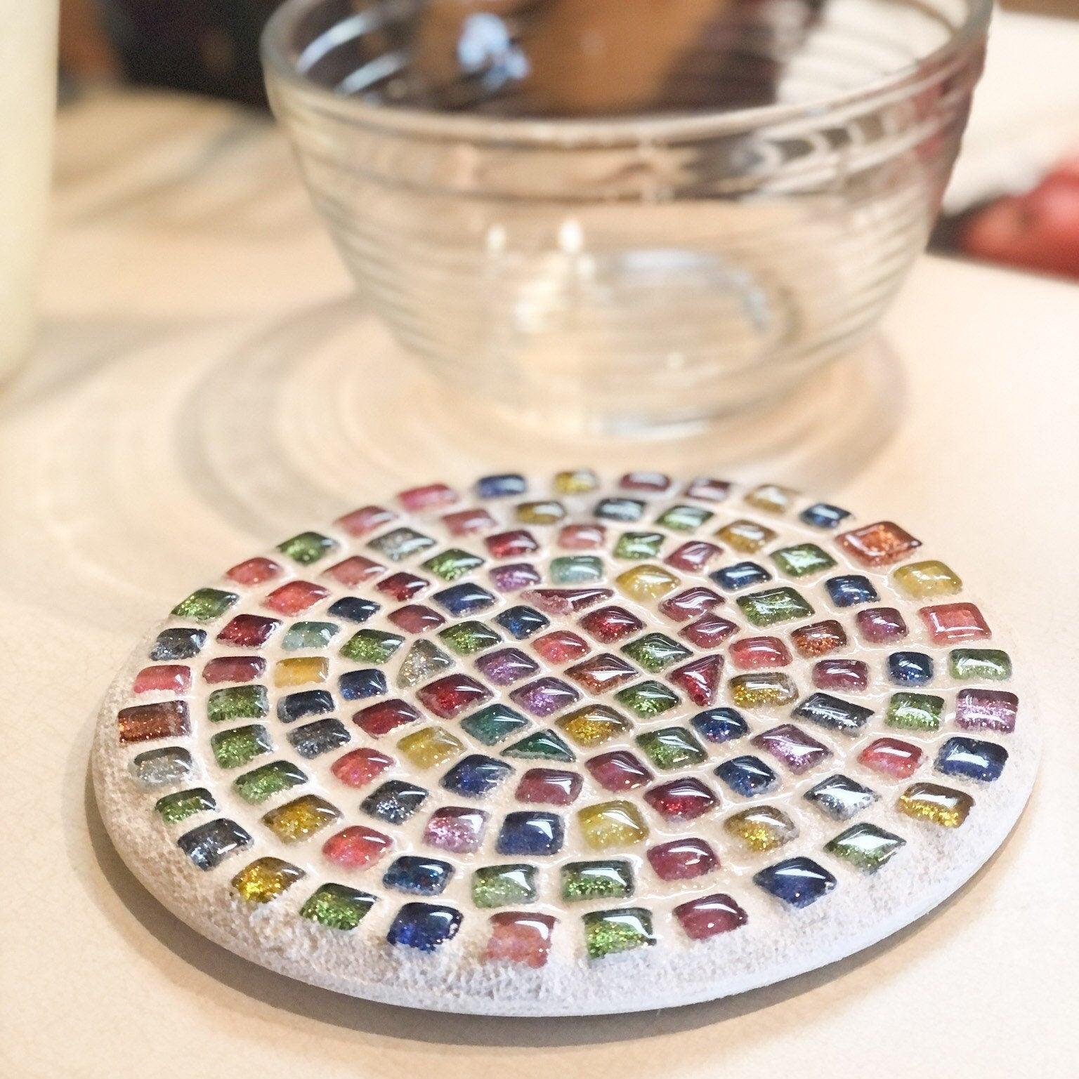 Handcrafted blue and amber mosaic plant stand with intricate tile design, ideal for displaying indoor or outdoor plants.