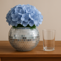 Shimmering mirror ball disco globe vase with reflective surface, perfect for modern home decor and party decorations.