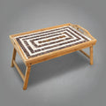Rustic bamboo bed tray with stone mosaic inlay, natural wood finish, ideal for breakfast or serving in a cozy bedroom setting.