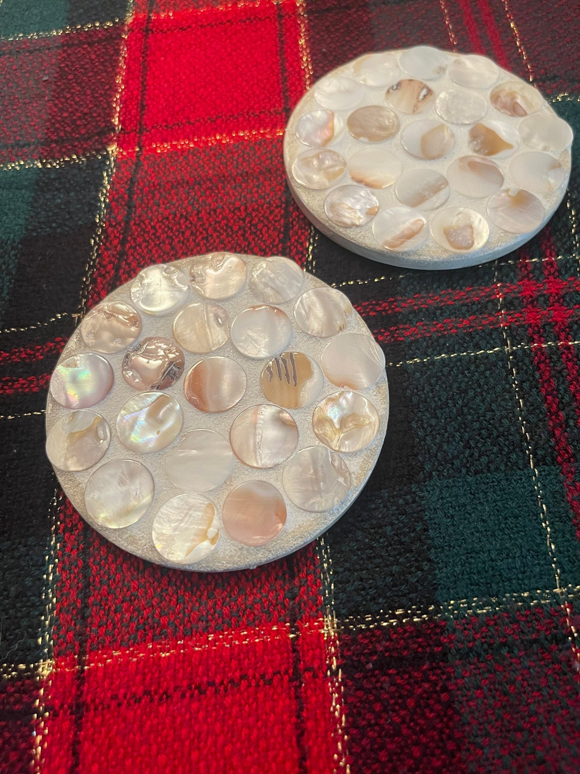 Handcrafted mother of pearl mosaic planter with intricate design, featuring a round shape and decorative floral patterns.