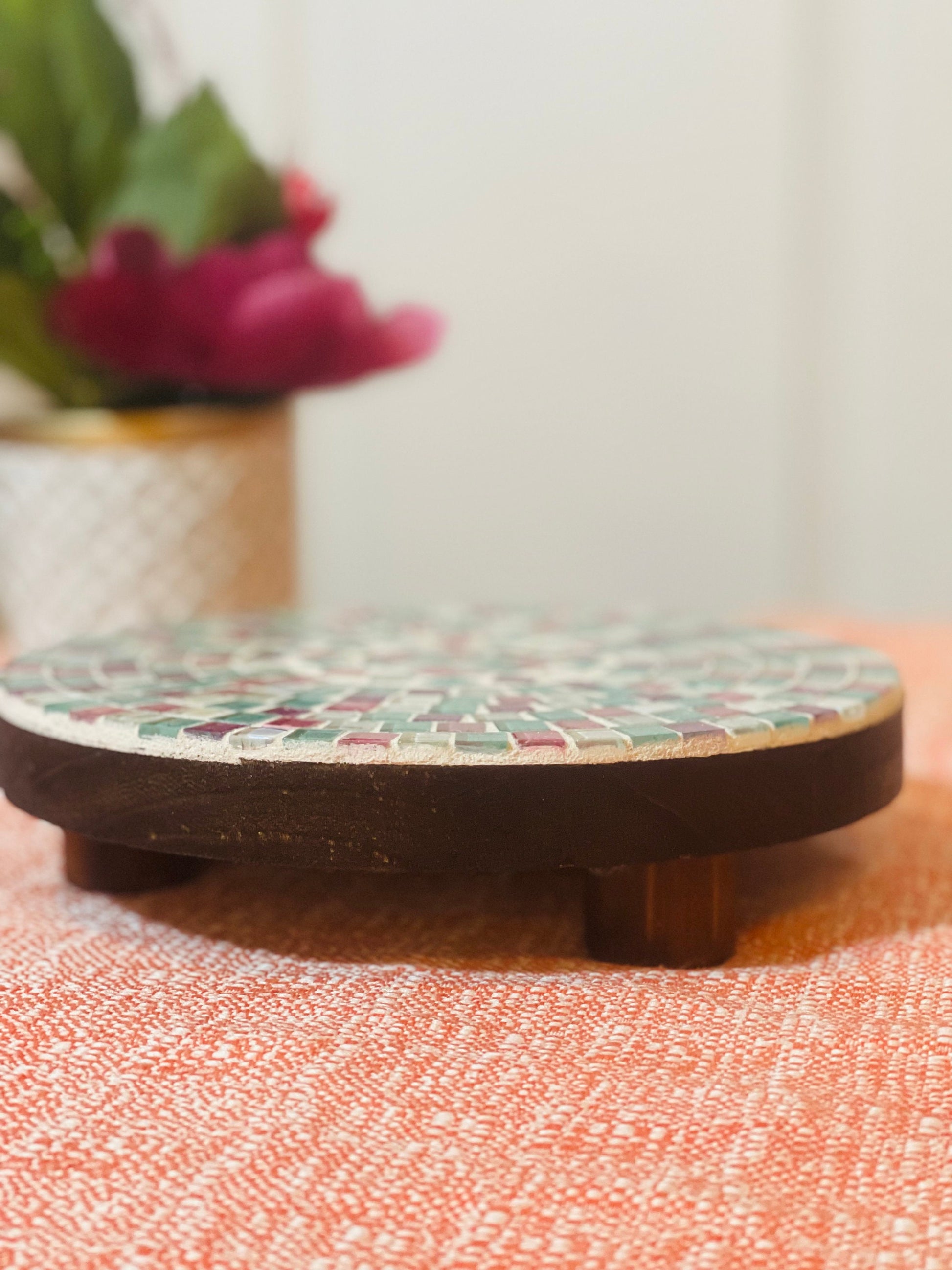 Handcrafted pink and green mosaic plant stand by Miss Bette's Creations, featuring intricate tile patterns and sturdy design.