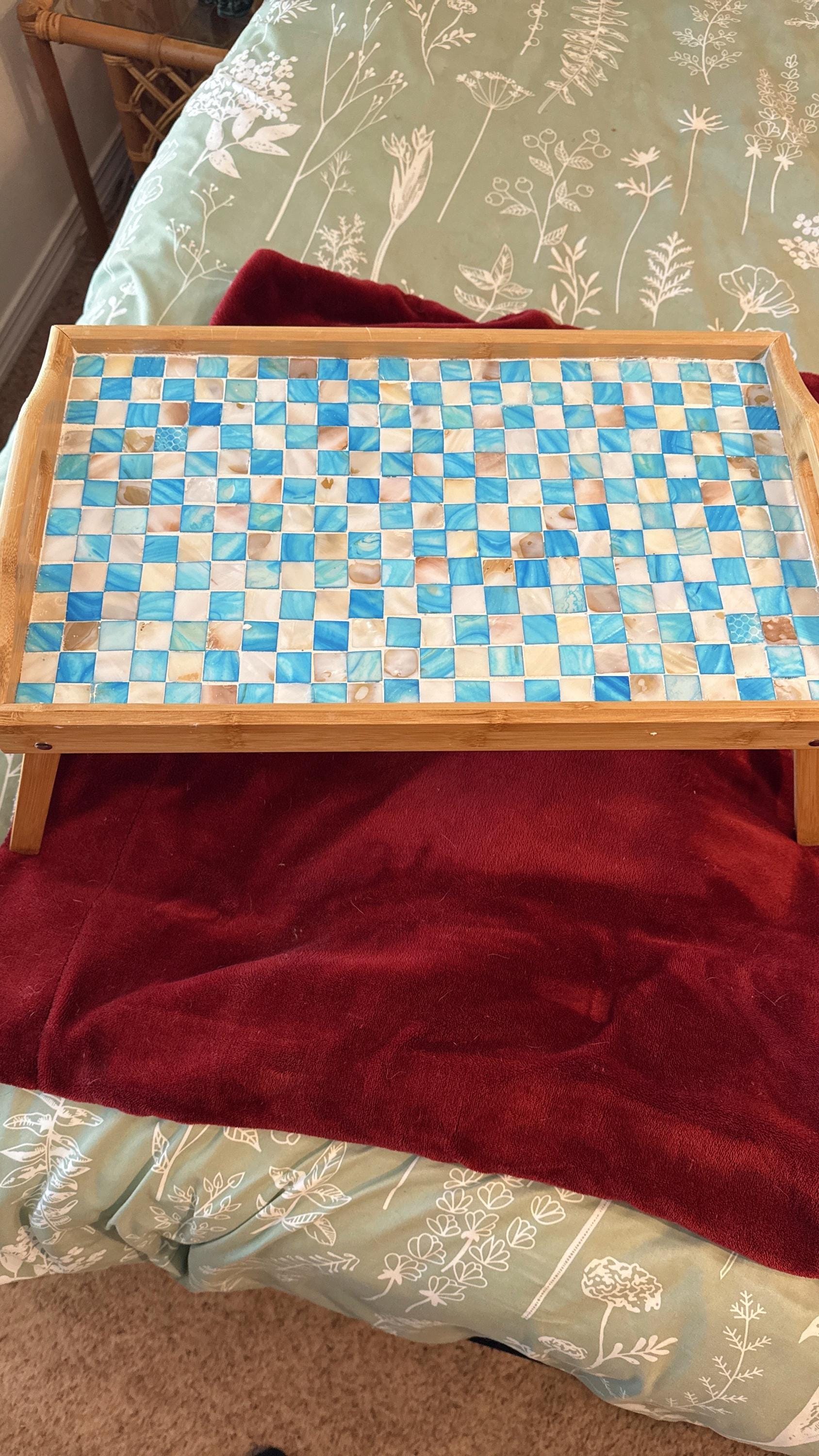 Luxury bamboo bed tray with mosaic inlay, featuring a natural bamboo surface and decorative mosaic details for elegant serving.