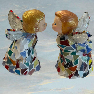 Handmade Christmas decor featuring two angel figurines with detailed wings and festive attire, perfect for holiday decoration.
