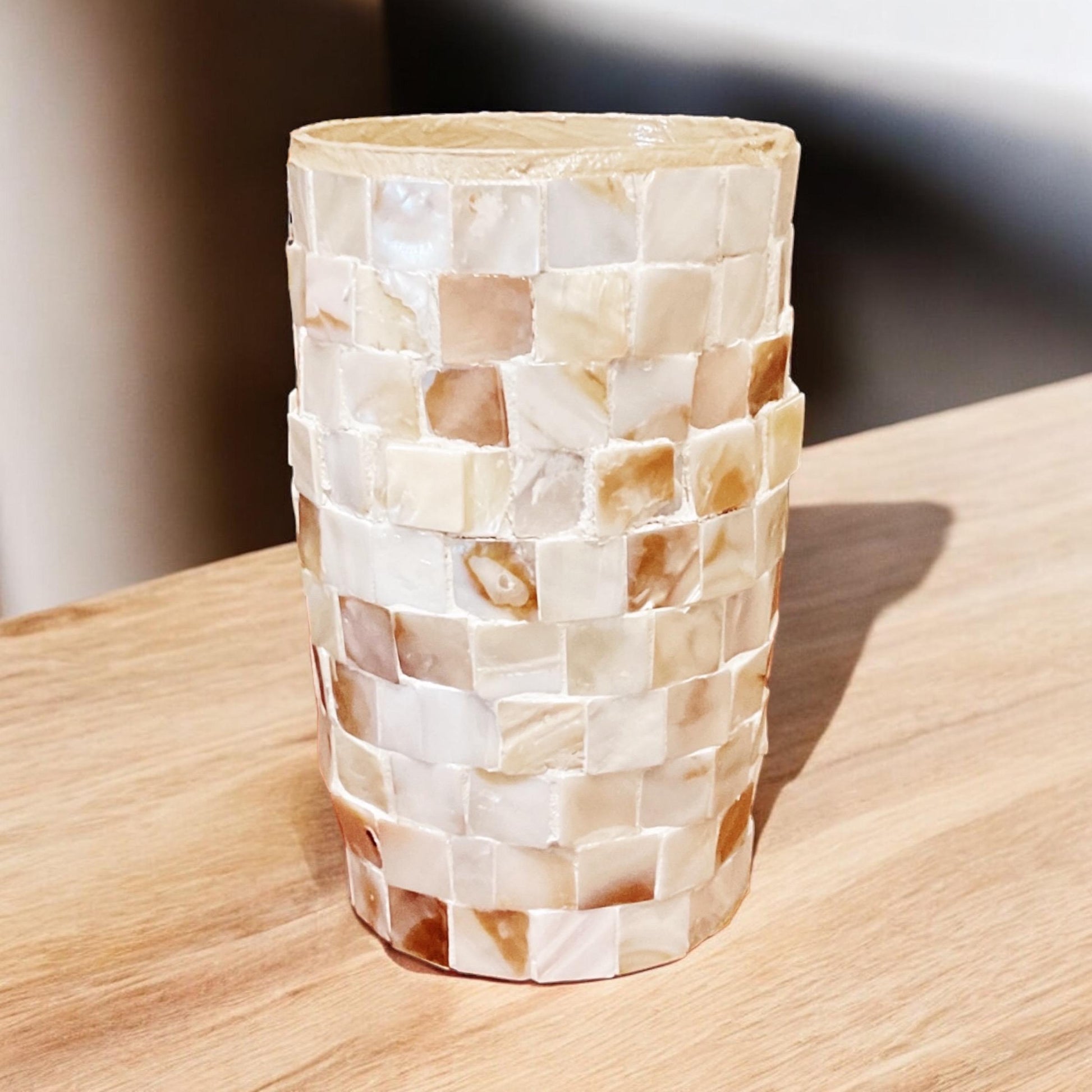 Ivory Coast Mother of Pearl cylindrical vase with iridescent finish, decorative home decor piece.