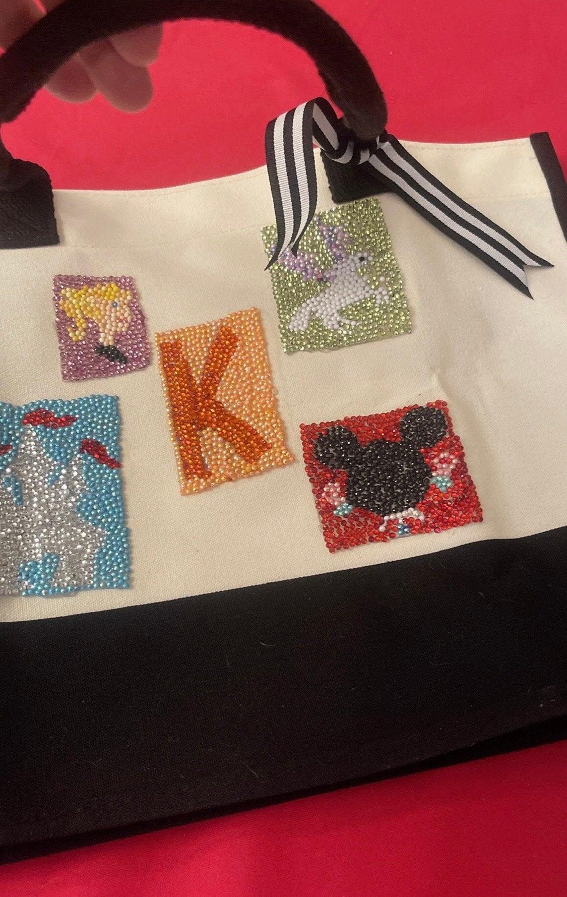 Handmade "K" initial fairy tale diamond art tote bag with intricate diamond pattern and colorful design.